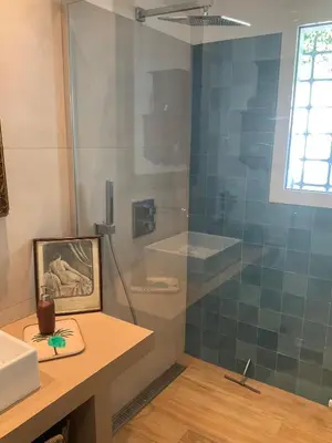 a bathroom with a shower and a sink at Maison avec vue mer et jacuzzi à 15 mn du centre in Nice