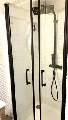 a glass shower door with the word life written on it at Beautiful Carré d'Or studio in Nice
