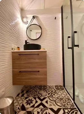 a bathroom with a sink and a mirror at Beautiful Carré d'Or studio in Nice