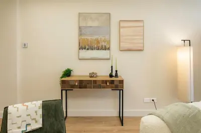 a living room with a table and a couch at L9 Marechal 2BDR Marechal, 5 min Sea10 min Old Town Parking AC in Nice