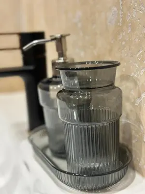 a group of glass cups sitting on a shelf at Le Notre Dame in Nice