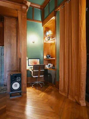 a room with a desk and a chair and a speaker at Appartement Haut Standing coeur de Nice pour 6pers in Nice