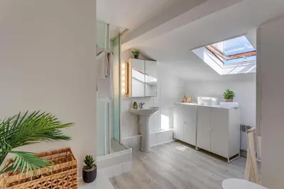 a bathroom with a sink and a toilet in a room at ATTIC URBAN AP4485 by Riviera Holiday Homes in Nice