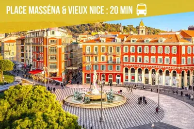 a view of a city with a fountain and buildings at Charmant studio près de la plage et la Promenade des Anglais in Nice