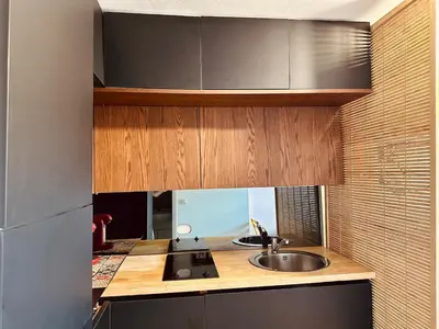a kitchen with a sink and a counter top at Cosy studio au Coeur du Centre Ville in Nice