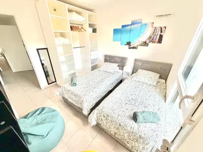 a kitchen with a white counter top in a room at Appartement 3 pièces avec parking a Nice Chez David in Nice