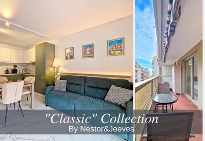a living room with a blue couch and a kitchen at Nestor&Jeeves - LE SAGITTAIRE - Terrasse, proche mer in Nice
