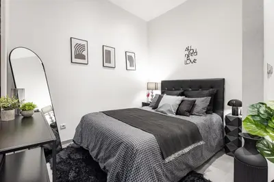 a white bedroom with a bed and a desk at Nice Renting - GALLO - New Modern Loft Old Town Massena in Nice