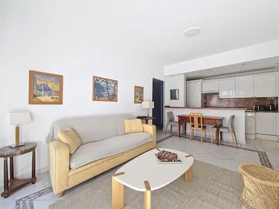 a living room with a couch and a table at Nestor&Jeeves - LADY BLUE - Terrace - Close sea in Nice