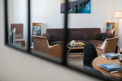 a living room with a couch and a table at 