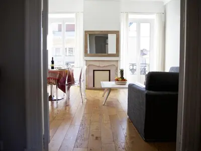 a living room with a couch and a fireplace at 