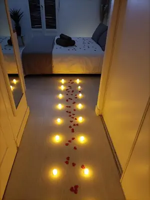 a hallway with lights and hearts on the floor at Apartsuite jardin Nice cap 3000 bord de mer in Saint-Laurent-du-Var