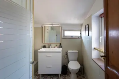 a small bathroom with a toilet and a sink at #36 Bright Eagle Nest Old town 5 mins from sea AC Wifi in Nice