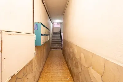 a hallway with a staircase in a prison cell at #36 Bright Eagle Nest Old town 5 mins from sea AC Wifi in Nice