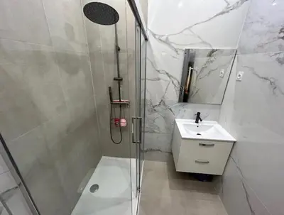 a bathroom with a shower and a sink at Au cœur du Vieux Nice, superbe studio refait à neuf in Nice