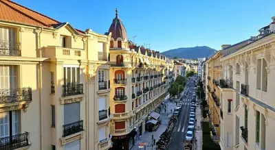 an aerial view of a city street with buildings at Le grand Escurial in Nice