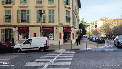 a white van parked in front of a building at chambre en colocation appartement partagé moyenne durée 1 in Nice