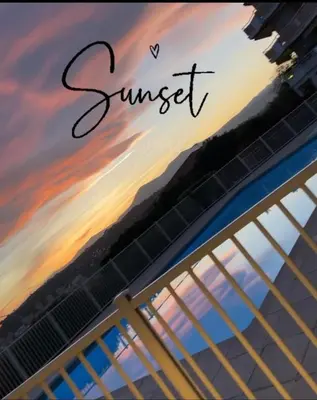 a sunset with the word sunset written on a bridge at Studio 27m2 en résidence standing piscine in Nice