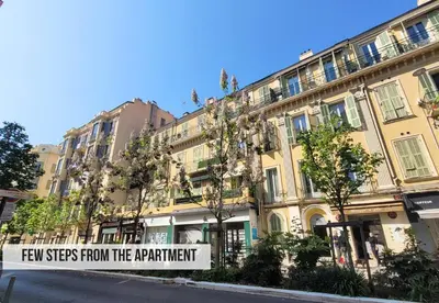 a building with a sign that reads few steps from the apartment at Nestor&Jeeves - BELA VISTA - Central - Close sea in Nice