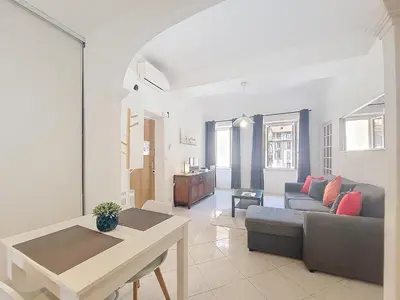 a living room with a couch and a table at Nestor&Jeeves - BELA VISTA - Central - Close sea in Nice