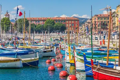 a bunch of boats are docked in a harbor at Cozy and bright appartement - Port of Nice in Nice