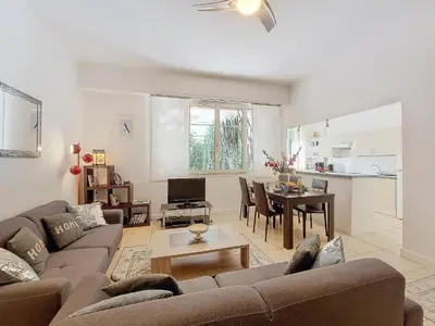a living room with a couch and a table at Nestor&Jeeves - SQUARE PROMENADE - Central - Close sea in Nice
