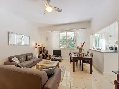 a living room with a couch and a table at Nestor&Jeeves - SQUARE PROMENADE - Central - Close sea in Nice