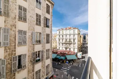 a view of a city street from a building at Centre Nice - 10 min plage - 5 min des transports en commun in Nice