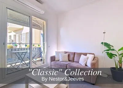 a living room with a couch and a balcony at Nestor&Jeeves - SWEETHEART - Central location - Close Old Town in Nice
