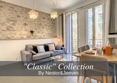 a living room with a couch and a table at Nestor&Jeeves - SWEET BEACH - Central - Near Beach in Nice