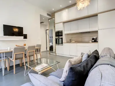 a living room with a couch and a table at Nestor&Jeeves - SWEET BEACH - Central - Near Beach in Nice