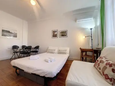 a room with two beds and a table and chairs at Nestor&Jeeves - ROXANE - Near Negresco - Close Beach in Nice