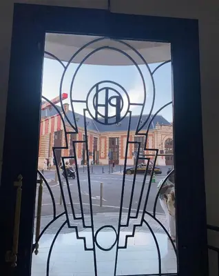 a window with a view of a city street at La casa in Nice