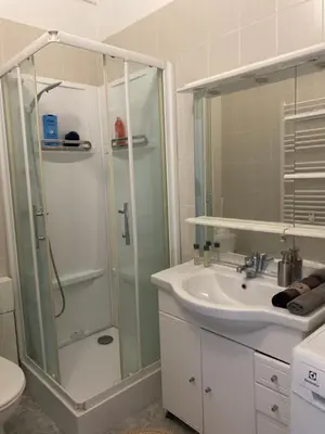 a bathroom with a shower and a sink at La casa in Nice
