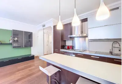 a large kitchen with a white counter and a sink at Nestor&Jeeves - CALIFORNIA - Central - Very close sea in Nice