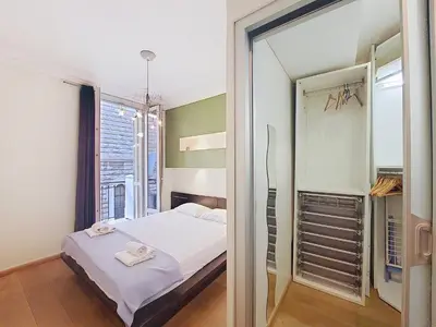 a small bedroom with a bed and a mirror at Nestor&Jeeves - CALIFORNIA - Central - Very close sea in Nice