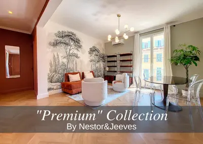 a living room with a dining room table and chairs at Nestor&Jeeves - PORT LYMPIA - Close Old Town - Port Area in Nice