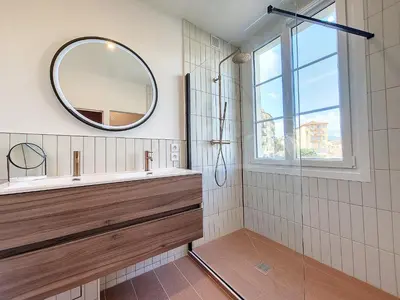 a bathroom with a mirror and a sink at Nestor&Jeeves - PORT LYMPIA - Close Old Town - Port Area in Nice