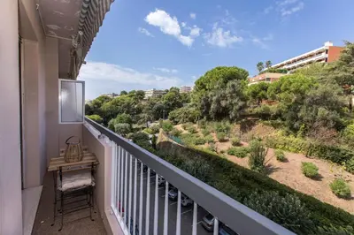 a balcony with a view of a garden at Breathtaking panoramic view of Nice ! in Nice