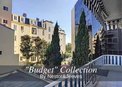 a sign for a building with trees and buildings at Nestor&Jeeves - L'OLYMPIC - Central - Very close sea in Nice