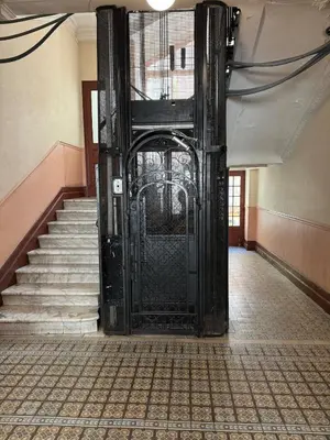 an open door in a room with stairs at Large Studio 7 minutes from Beach in Nice