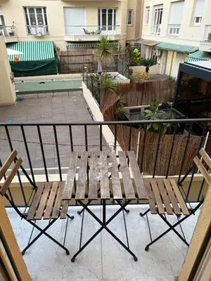 a bathroom with a sink and a toilet and a shower at Appartement central avec balcon in Nice