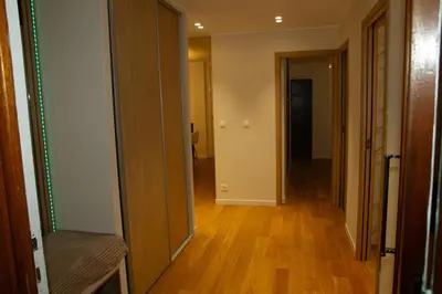 an empty hallway with a hallway leading into a room at LE PALAIS DIANE - Apt cosy, Moderne et Climatisé in Nice