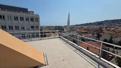 a view of a city from the balcony of a building at LX155 Roof terrace city center Mobility Lease in Nice