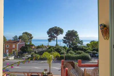 a view of the ocean from a balcony at Bord de mer - Beau 2 pièces rénové - Parking - EX in Èze