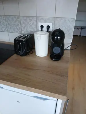 a counter top with a coffee maker and a blender at vacances au soleil in Cagnes-sur-Mer
