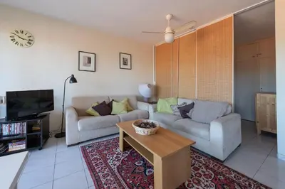 a living room with two couches and a coffee table at fisher in Beaulieu-sur-Mer