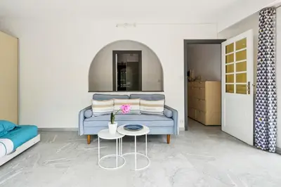 a balcony with two chairs and a table at LX173 Studio grande terrasse vue mer tres calme in Nice
