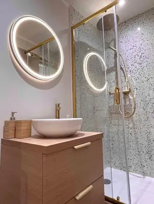 a bathroom with a sink and a shower with a mirror at Cozy apartment in the heart of Nice - 3 to 4 people in Nice