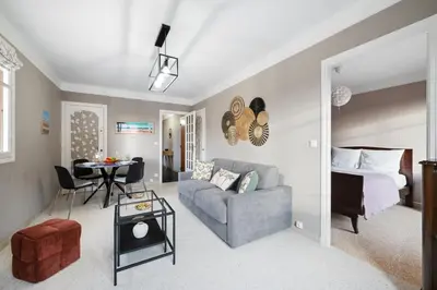 a living room with a couch and a bed at Casa Nissa Vieux-Nice in Nice